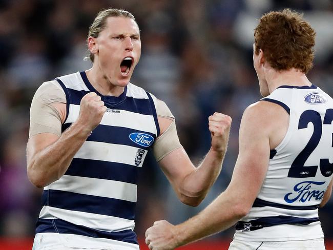 Mark Blicavs celebrates with Gary Rohan. Picture: Dylan Burns/AFL Photos via Getty Images