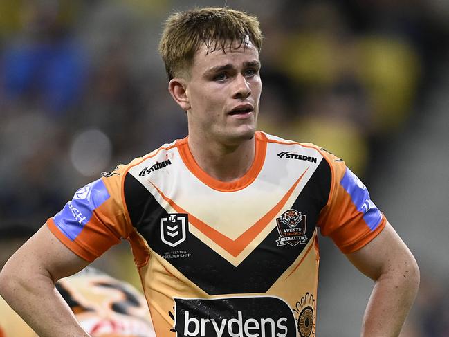 TOWNSVILLE, AUSTRALIA - MAY 24: Lachlan Galvin of the Tigers looks on after a Cowboys try during the round 12 NRL match between North Queensland Cowboys and Wests Tigers at Qld Country Bank Stadium, on May 24, 2024, in Townsville, Australia. (Photo by Ian Hitchcock/Getty Images)