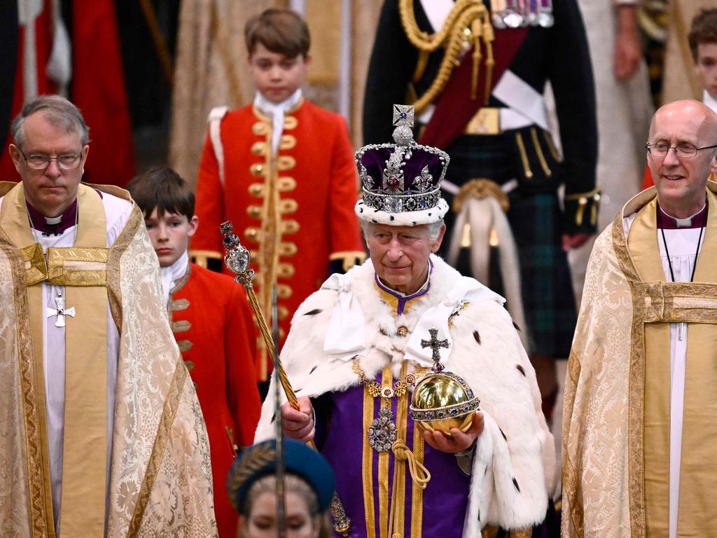 King Charles, followed by Prince George, after the ceremony. Picture: AFP