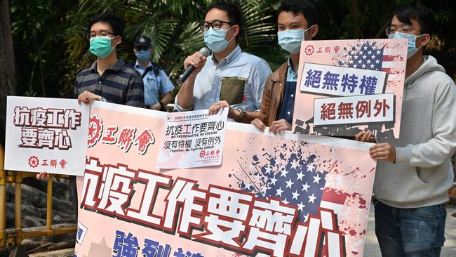 Members of the Hong Kong Federation of Trade Unions protest outside the US consulate in Hong Kong on Tuesday. Picture: AFP