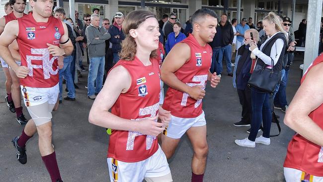 Daniel Kerr running out with the Tyabb Yabbies. Picture: Jason Edwards