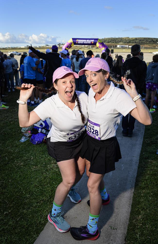 Vanessa Gibson (left) and Elisa Denyer, part of team Social Fitness Club, are ready for the dress-up Runway Mile of the Toowoomba Marathon events at Wellcamp Airport, Saturday, May 3, 2025. Picture: Kevin Farmer