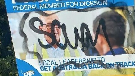 Vandalism on corflutes in Peter Dutton's electorate.