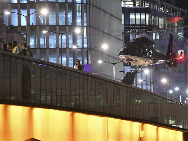 An helicopter lands on London Bridge after an attack in central London. Picture: PA/via AP