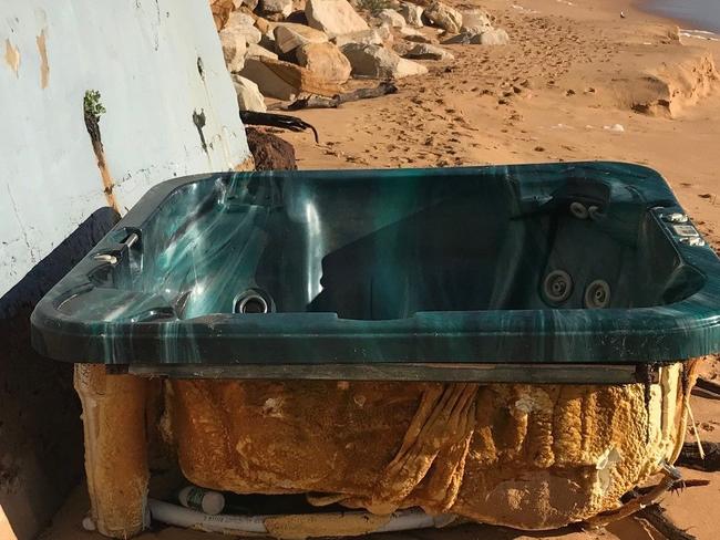 A fibreglass jacuzzi that washed up on Collaroy Beach was removed by a council clean-up crew. Picture: Northern Beaches Council