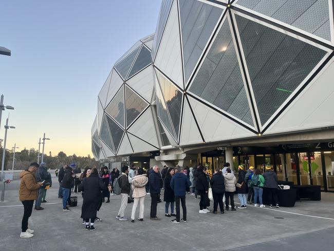 Fans queue outside AAMI Park.