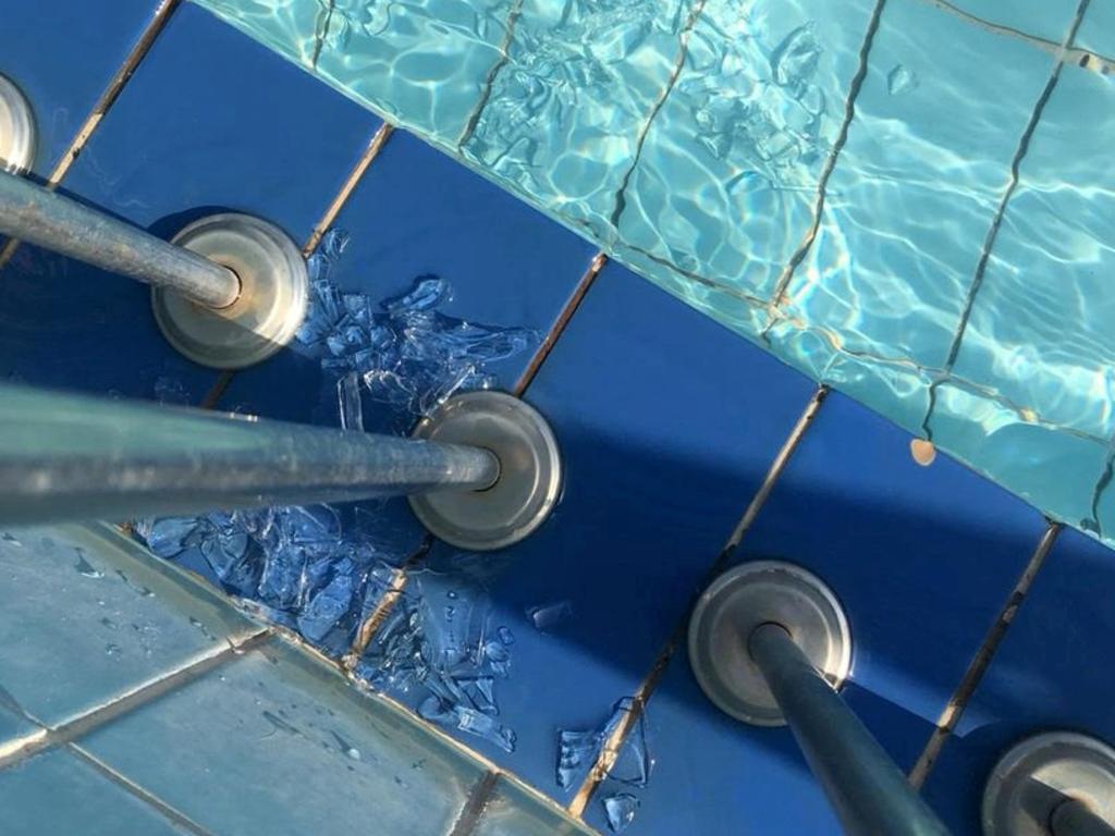 The family found shards of glass by the side of the pool. Picture: SWNS/Mega