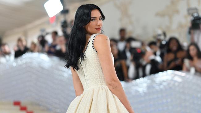 Dua Lipa wears a 1992 Chanel couture gown by Karl Lagerfeld. Picture: Angela Weiss/AFP