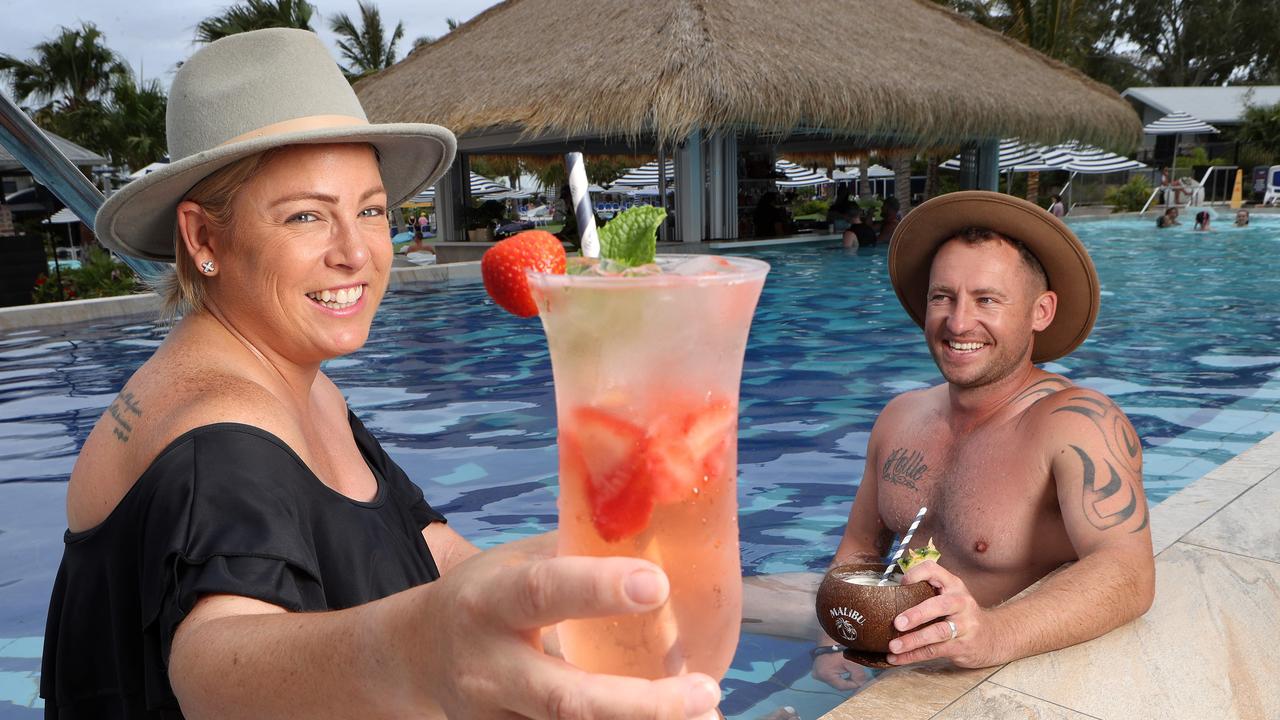 Jess and Will Turnbull of Bribie Island at the swim-up bar at BIG4 Sandstone Point Holiday Resort. Picture: Liam Kidston