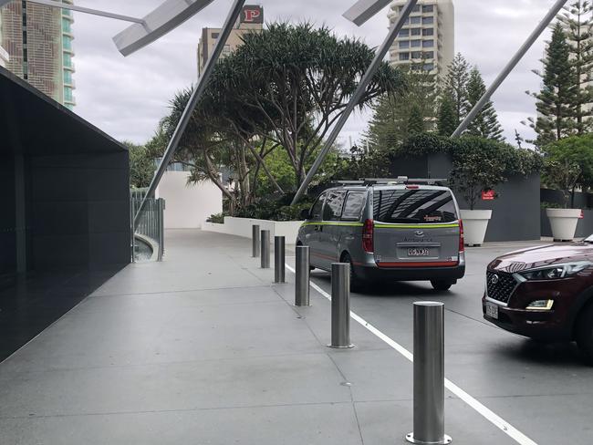 An ambulance outside Q1 on the Gold Coast where paramedics were called to a patient presenting with suspected symptoms of coronavirus.