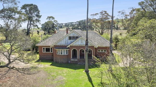 A circa-1940s brick homestead stands at the Mount Moriac family.