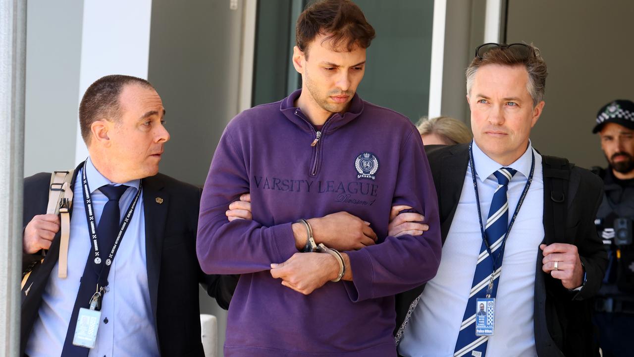 Accused attempted murderer Zacharia Josef Bruckner is led through Adelaide Airport under police escort on November 17, 2023. . Picture: NCA NewsWire / Kelly Barnes