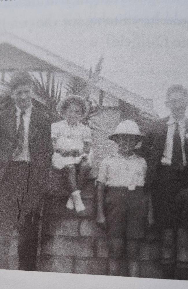 Gale in 1941 wearing a 'pith' army helmet with family