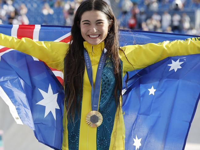 Arisa Trew shows off her gold medal. Picture: Michael Klein