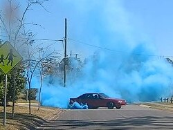 QLD Police have released dash-camera footage of a red Holden Commodore VP conducting a gender reveal as part of the investigation into the dangerous operation of a vehicle at Marsden.