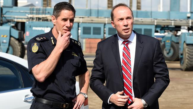 Then Immigration Minister Peter Dutton (right) and then Australian Border Force commissioner Roman Quaedvlieg in 2015.