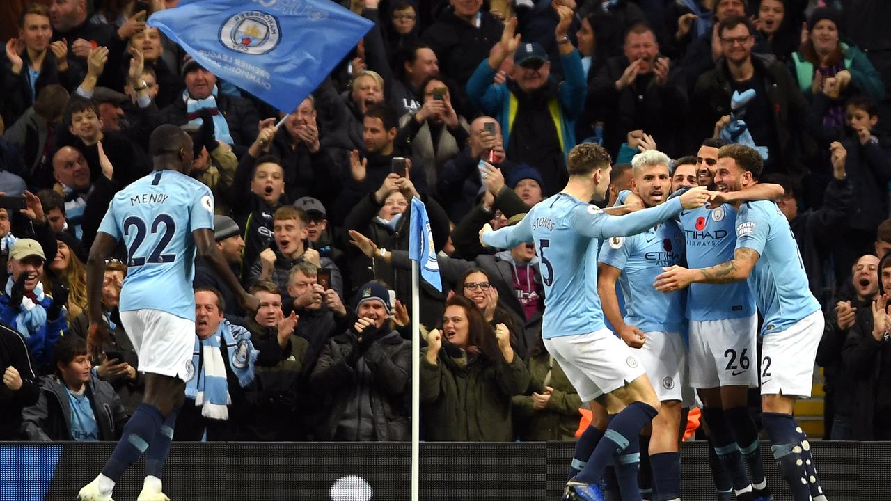 Sergio Aguero celebrates with teammates after scoring a goal. Picture: Getty Images