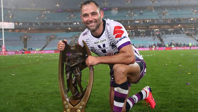 Cameron Smith poses with the premiership trophy. Picture: Getty