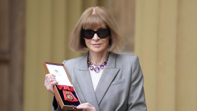 Legendary Vogue editor ditches sunnies to meet King Charles