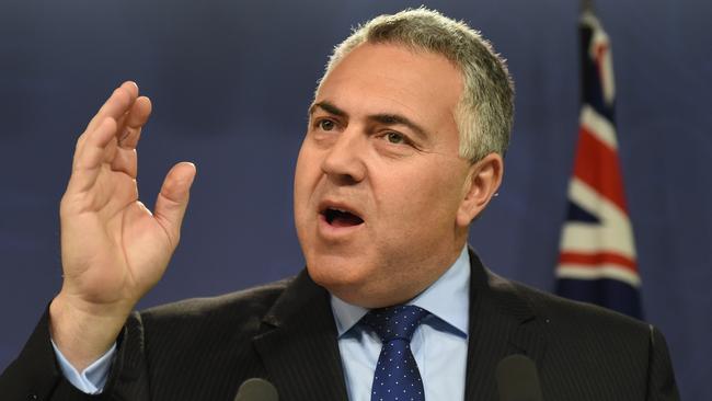 Political win ... Australian Federal Treasurer Joe Hockey gets his small business tax break throguh the Senate. Picture: AAP