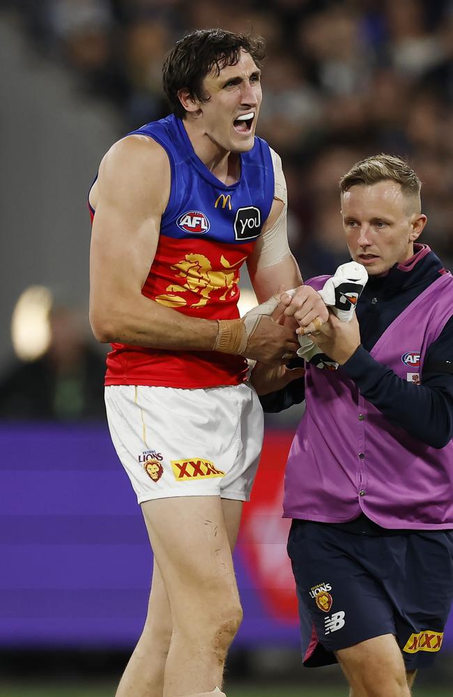 Oscar McInerney of the Lions after re injuring his shoulder during the 3rd quarter. Picture: Michael Klein