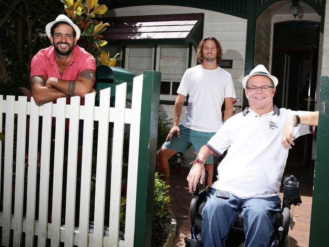 Philip Stephens (with Emiliano Bisson and Marcos Peluffo) broke his neck in the surf at Long Reef when he was 18. It hasn't stopped him from enjoying life and he has travelled to 32 countries. Picture: Martin Lange.