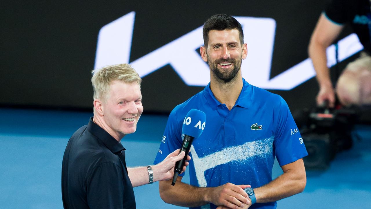 Novak Djokovic and Jim Courier. Photo by Andy Cheung/Getty Images.