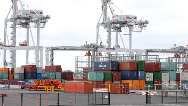 Containers stacked up high at Webb Dock unable to leave because of an industrial dispute. Picture: Michael Klein