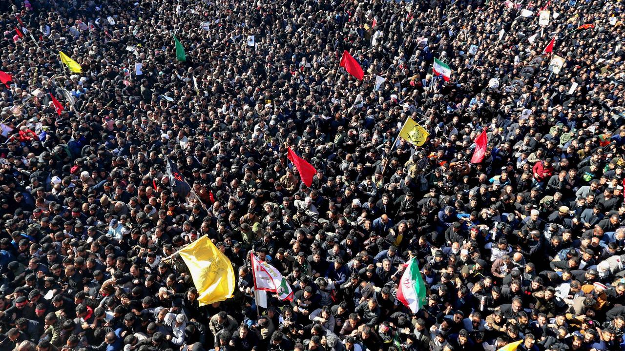 Iranian mourners gather during the final stage of funeral processions for slain top general Qasem Soleimani, in his hometown Kerman. Picture: Atta Kenare / AFP