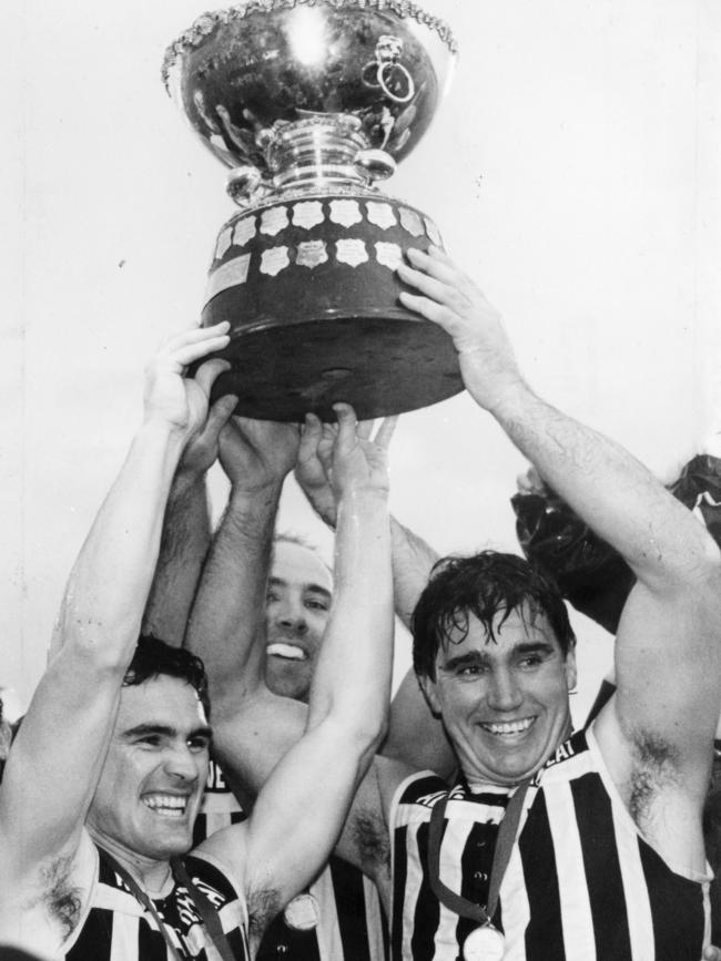 Tim Ginever (left) and Greg Phillips (right) celebrating after Port Adelaide won the 1992 SANFL grand final against Glenelg. Picture: News Corp 