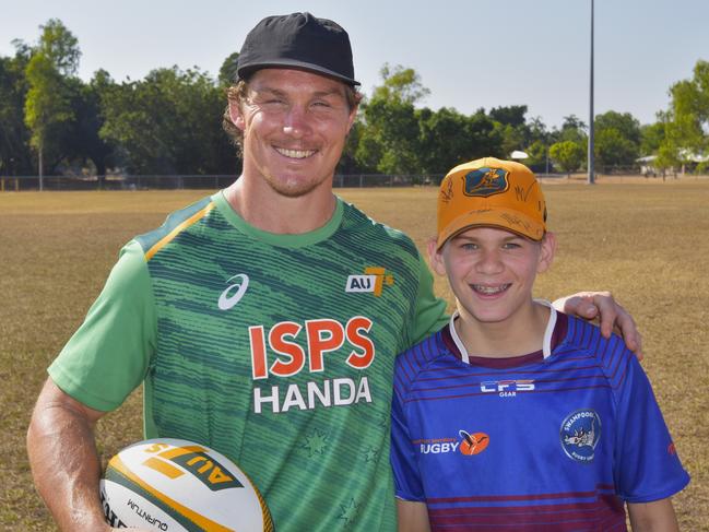 Former Wallabies captain turned 7s player Michael Hooper with NT rugby junior Clancy Nason. Picture: Darcy Jennings.