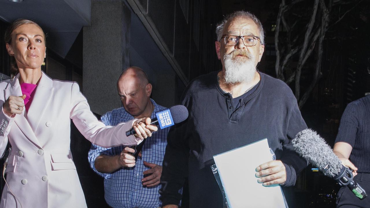 High profile lawyer Michael Bosscher leaves the Brisbane Watch House on Tuesday night. Picture: Lachie Millard.