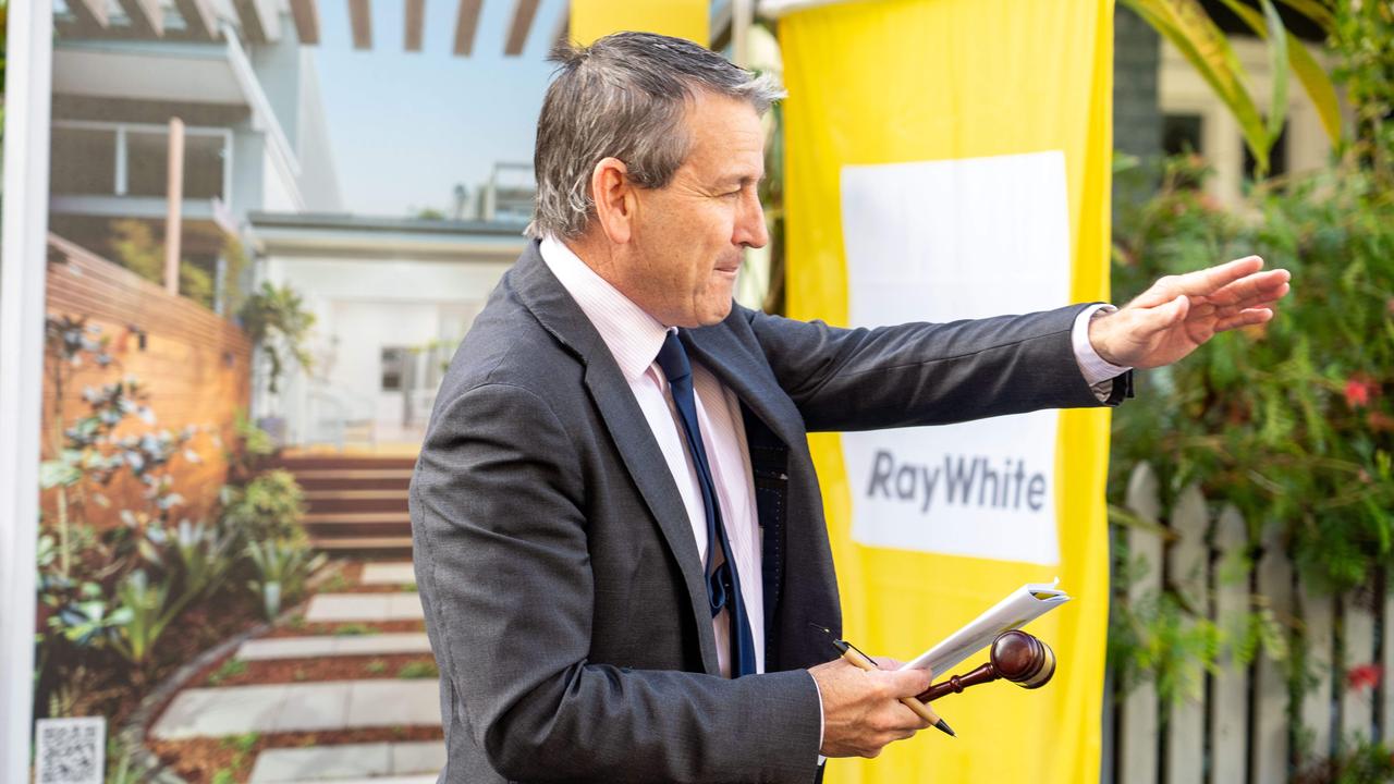 Auctioneer James Keenan pictured at a hot auction in Newtown, Sydney. Picture: Tom Parrish