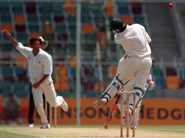 Steve Waugh evades a pinpoint bouncer from Wasim Akram.