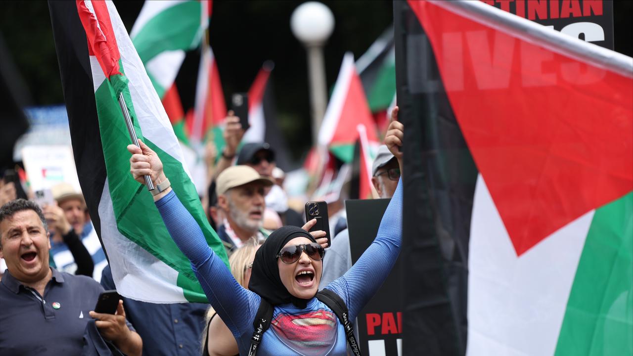 Attendees marched around the CBD following the speeches. Picture: NCA NewsWire/ Dylan Robinson