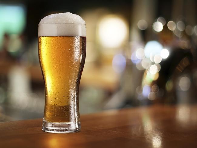 Glass of light beer, Barmans arms pulling a pint of beer, Beer, Bar, Bar Area, Beer Pump, Bartender, Alcohol, People, Pint Glass, Drink, Casual Clothing, Ireland, Relaxation, Young Adult, 20-24 Years, Adult, Adults Only, Colour Image, Cork, Day, Filling, Front View, Glass, Happy Hour, Holding, Horizontal, Indoors, Lager, Mid Section, Mixed Race Person, Nightlife, Occupation, One Man Only, One Person, One Young Man Only, Only Men, Photography, Pulling, T-Shirt, Working, Young Men, thinsktock, istock, beer, generic, pouring beer