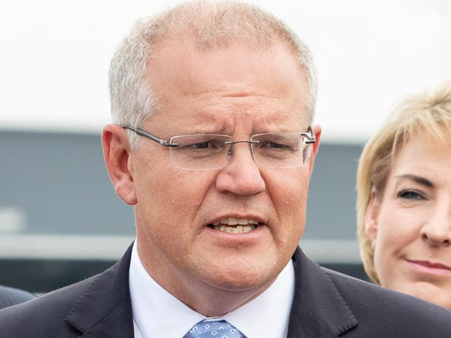 Australian Prime Minister Scott Morrison (centre) addresses the media in Perth on Friday, March 8, 2019. (AAP Image/Richard Wainwright) NO ARCHIVING