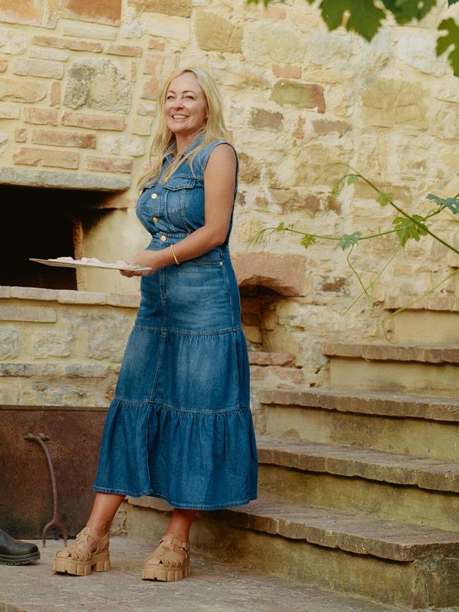 Conley by the outdoor oven.