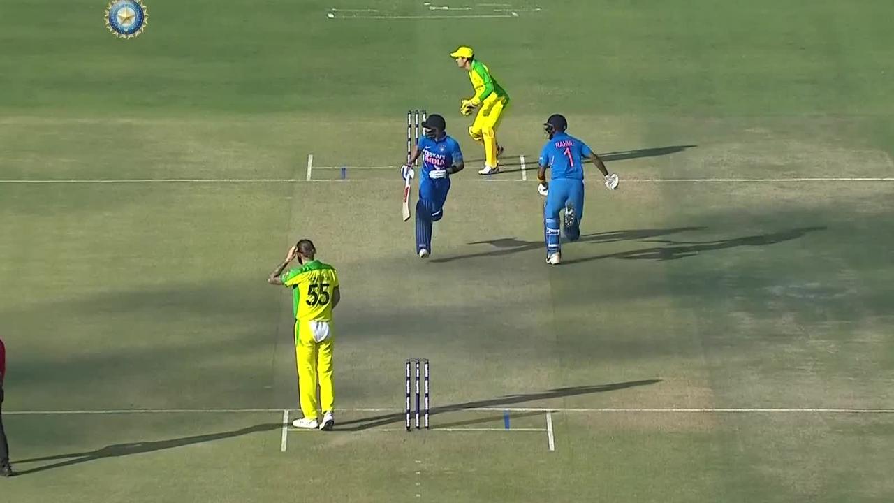 Virat Kohli running down middle of pitch