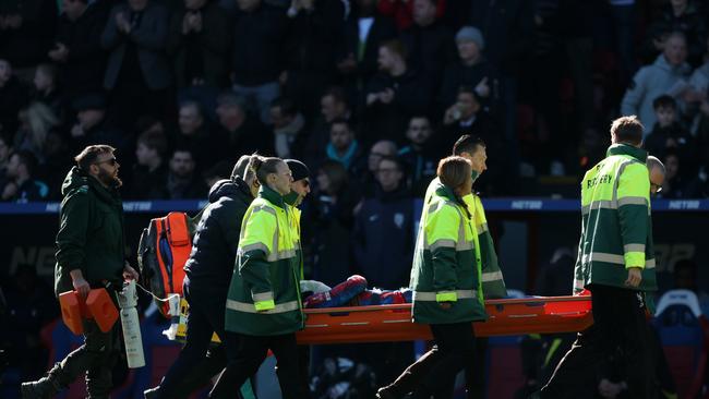 LONDON, ENGLAND - MARCH 01: Jean-Philippe Mateta of Crystal Palace is stretchered off the pitch by medical staff after a challenge by Liam Roberts of Millwall (not pictured) which resulted in a red card during the Emirates FA Cup Fifth Round match between Crystal Palace and Millwall at Selhurst Park on March 01, 2025 in London, England. (Photo by Julian Finney/Getty Images)