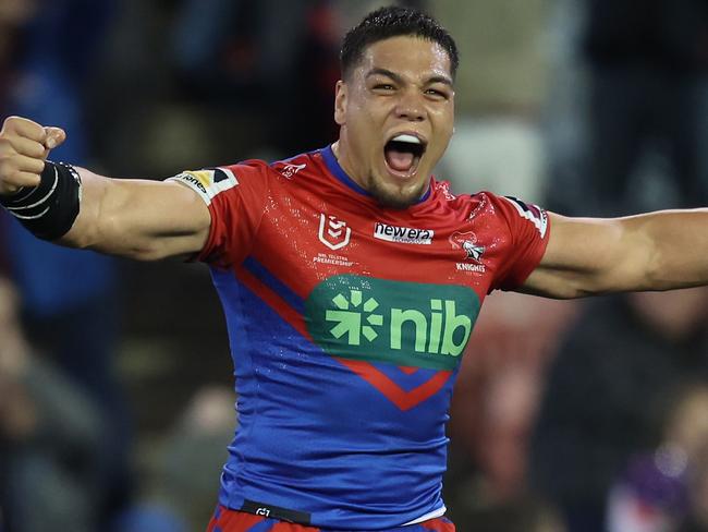 NEWCASTLE, AUSTRALIA - JULY 22: Jacob Saifiti and Adam Elliot of the Knights react to the teams win  during the round 21 NRL match between Newcastle Knights and Melbourne Storm at McDonald Jones Stadium on July 22, 2023 in Newcastle, Australia. (Photo by Scott Gardiner/Getty Images)