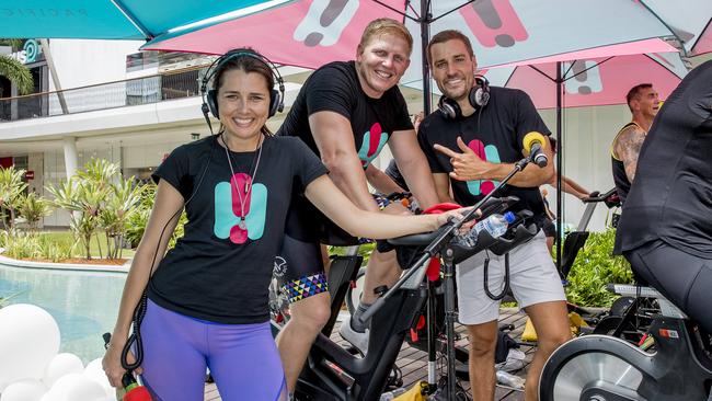 SeaFM radio host Ben Hannant is cycling for 24 hours to raise money for mum with brain cancer at Pacific Fair. SeaFM's breakfast team, Heather Maltman and Dan Anstey supporting Ben Hannant. Picture: Jerad Williams