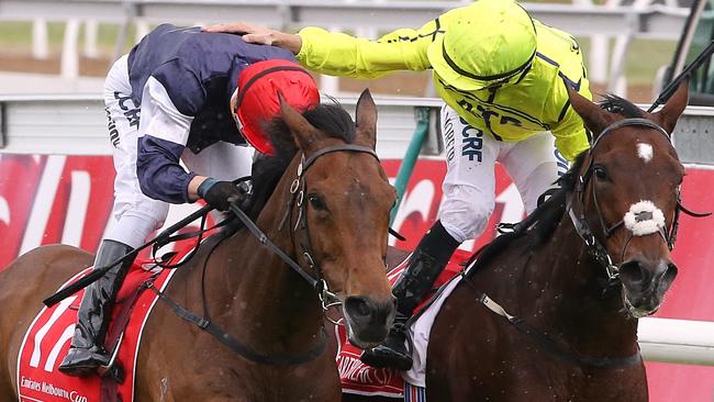 The 2016 Melbourne Cup day of racing at Flemington Racecourse Melbourne Cup Race 7 Kerrin McEvoy wins on no 17 Almandin with Heartbreak City ridden by Joao Moreira second on the inside Picture: Wayne Ludbey