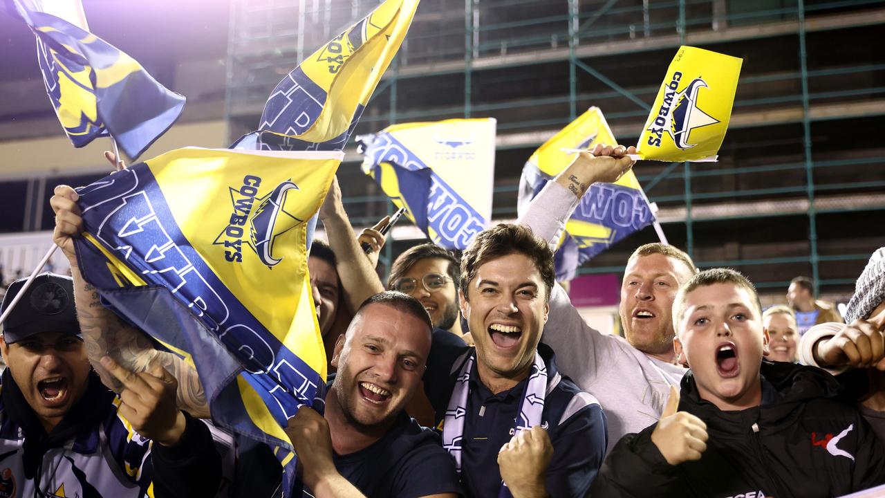 Cowboys fans celebrate winning the NRL qualifying final against Cronulla. Picture: Mark Metcalfe/Getty Images)