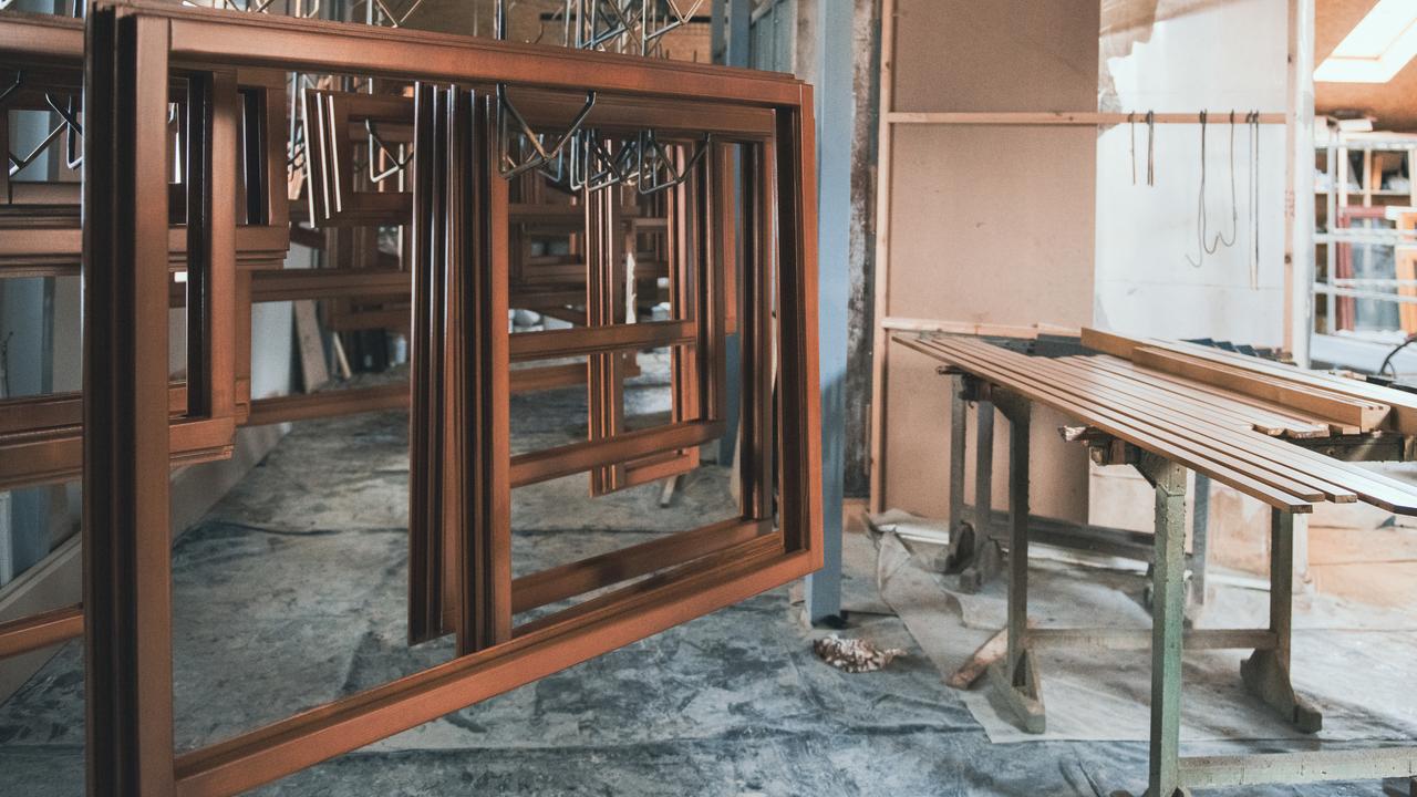 Handmade custom wooden window frames take time to build.