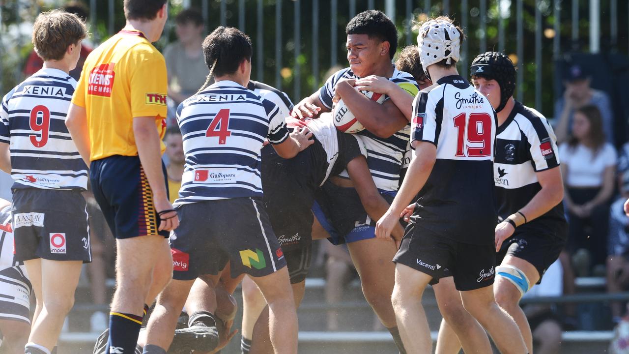 Malachi Figota (with the ball in hand). Action from the Under 16 Brisbane junior rugby league grand final between Brothers and Souths at Norman Park. Picture Lachie Millard