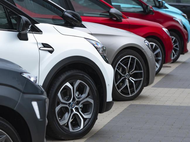 Cars parked on a public parking. Escape 14 January 2024ExpertPhoto - iStock