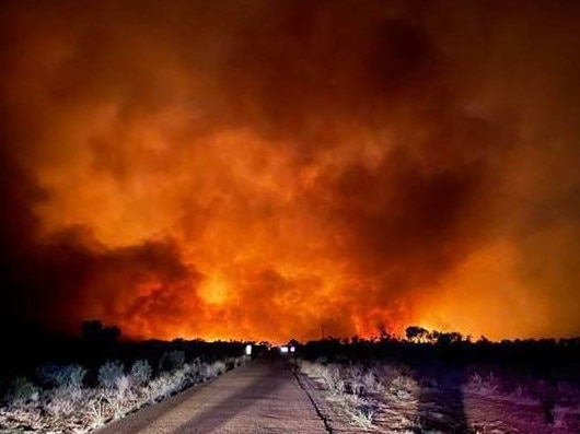 A bushfire that began at Kuraya Outstation burns near Tennant Creek in October 2023. Picture: Bushfires NT