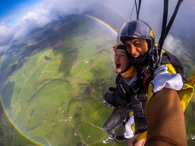 Skydiver’s snap: 360° double-rainbow