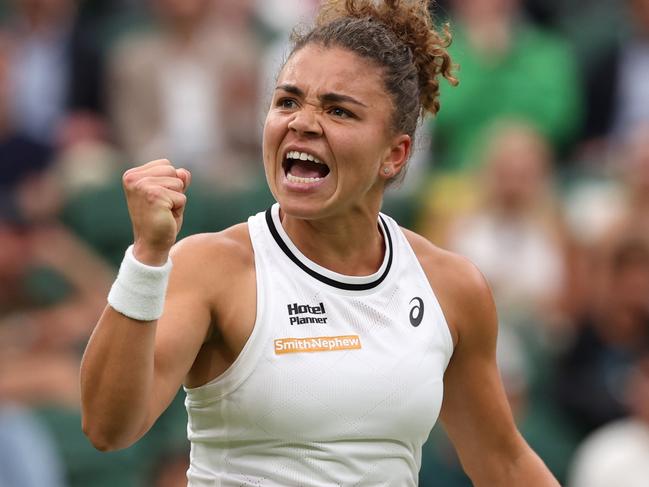 LONDON, ENGLAND - JULY 09: Jasmine Paolini of Italy celebrates as she plays against Emma Navarro of United States in the Ladies' Singles Quarter Final match during day nine of The Championships Wimbledon 2024 at All England Lawn Tennis and Croquet Club on July 09, 2024 in London, England. (Photo by Sean M. Haffey/Getty Images)